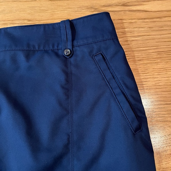 Izod Womens Skort Navy Blue Pockets Golf  Solid Zip Button Front Pleated Hem - Picture 2 of 9